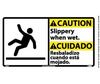 Caution Slippery When Wet Sign Bilingual Rigid Plastic 10" x 18"